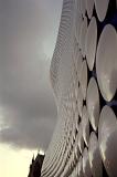Close up Architecture of Famous Selfridges Store at Bullring, Birmingham on Gray Sky Background.