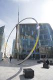 a giant hoop and needle or arrow sculpture called alliance by french artist Jean-Bernard Metais in central cardiff