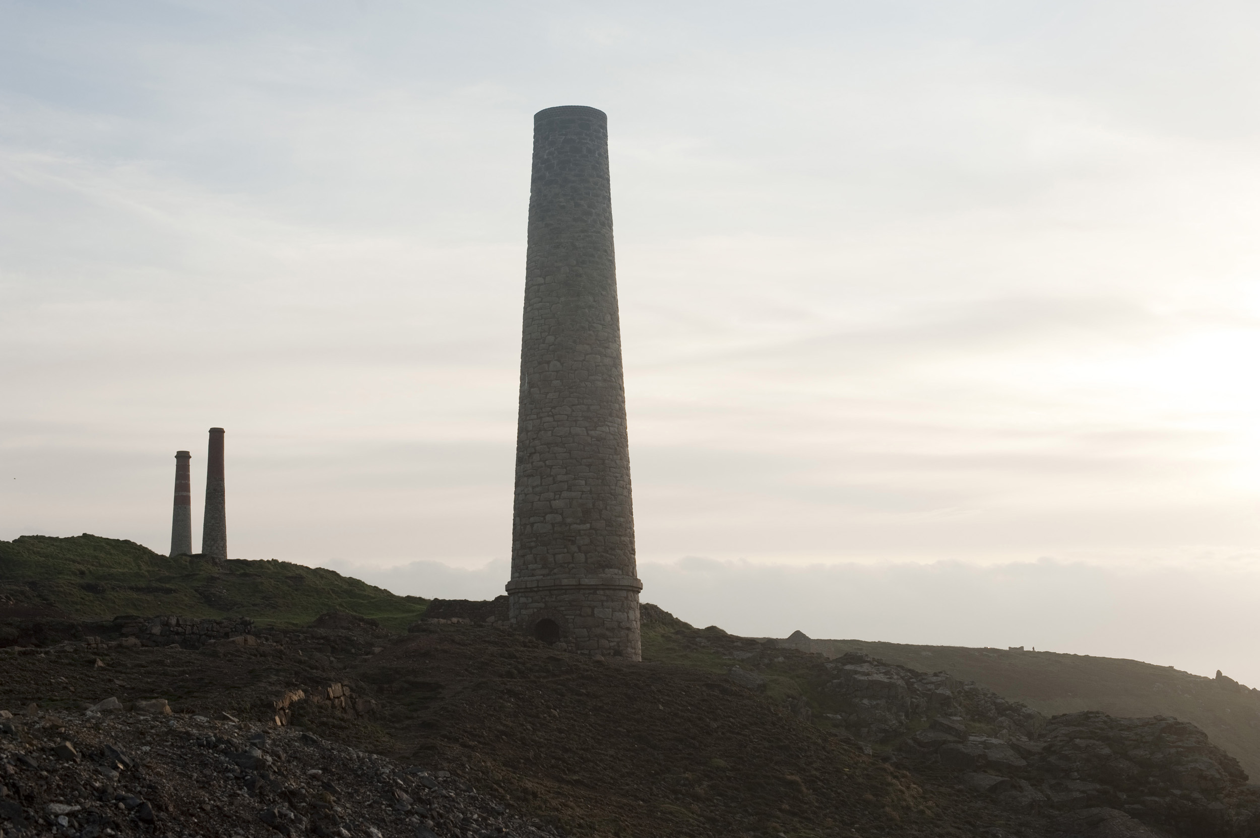 an image of Old mine chimneys at the levant mine, Part of the Cornwall Mining Landscape World Heritage Site
