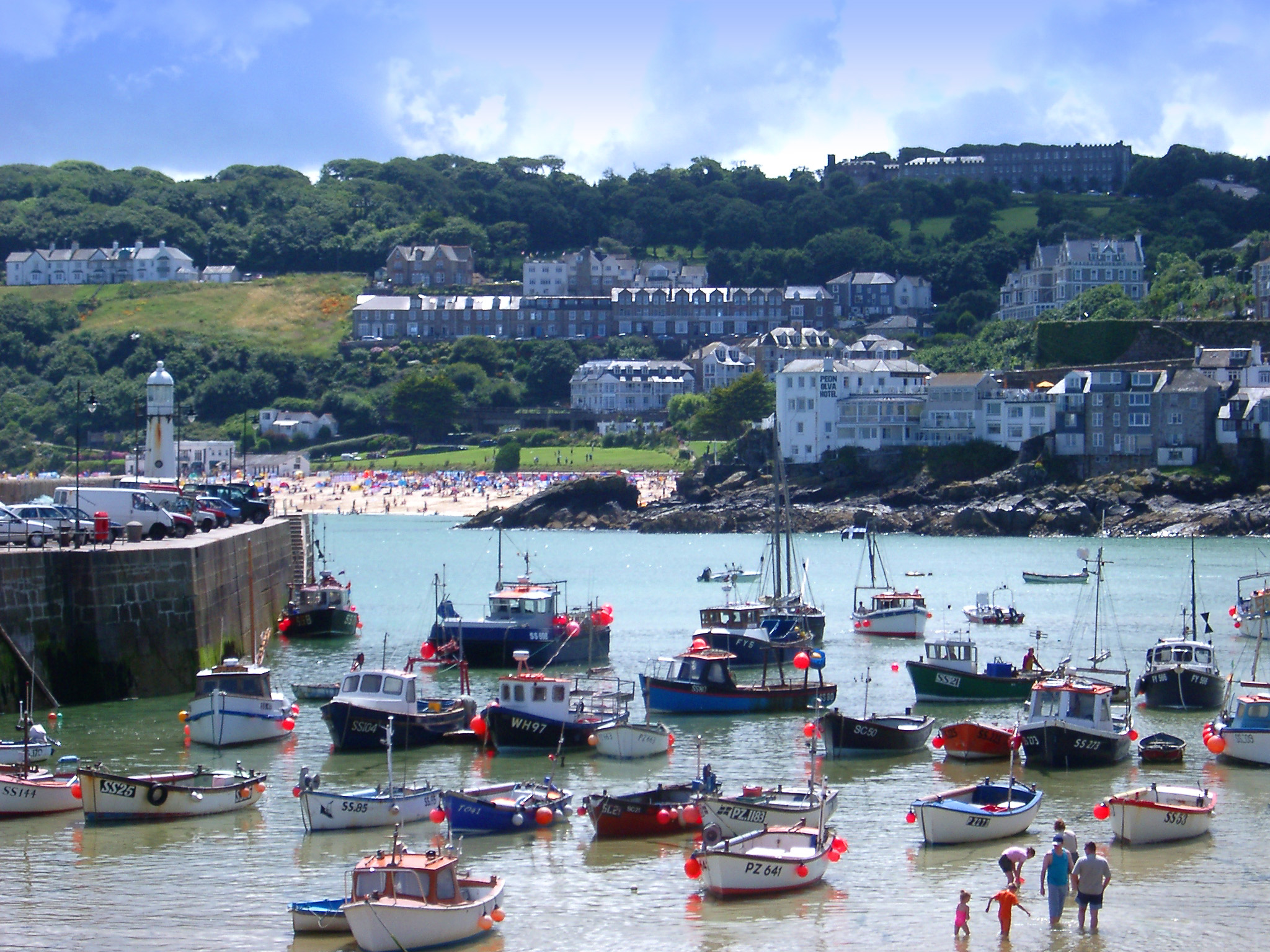 an image of boats in the harbour at st ives, cornwall