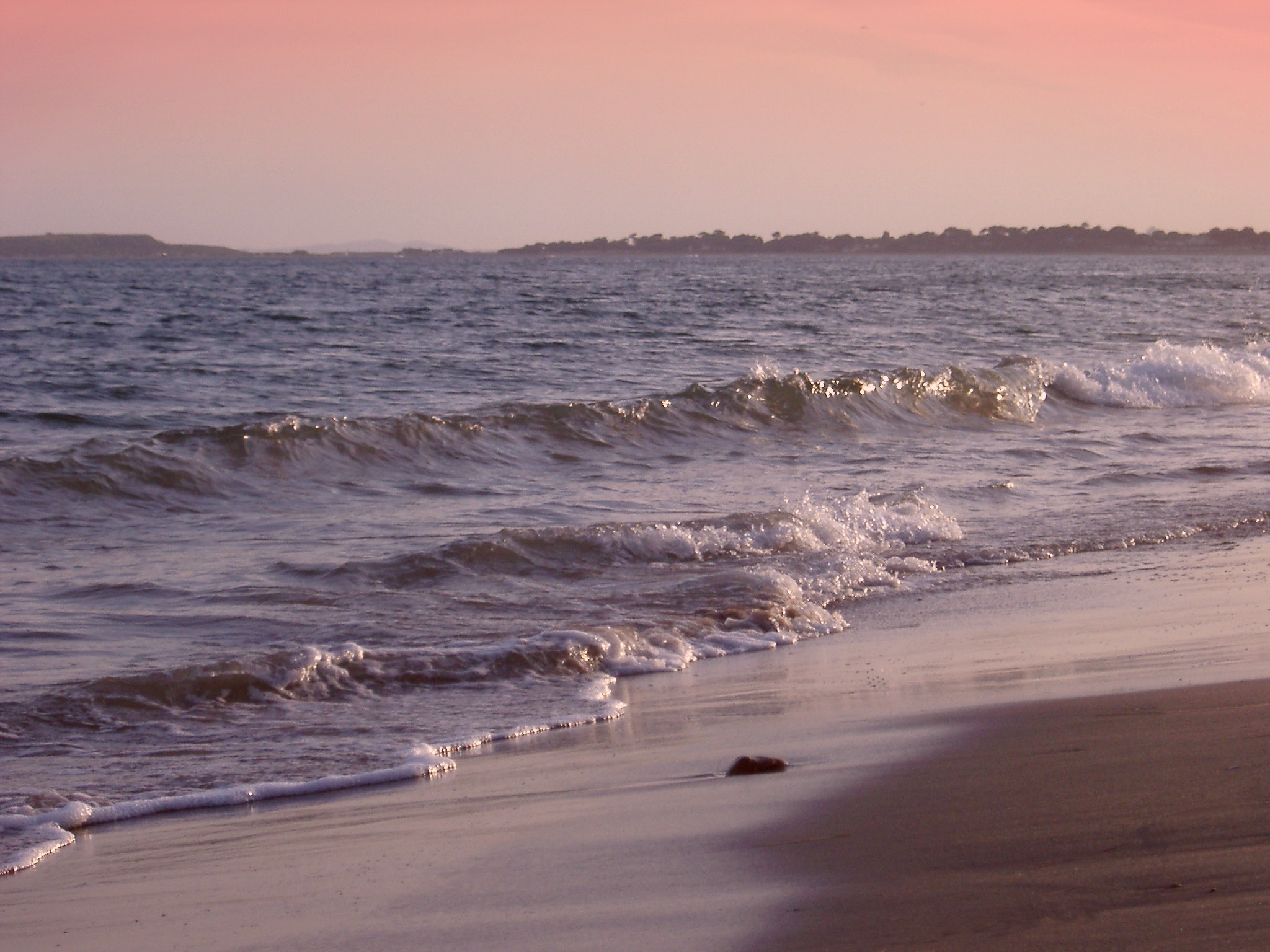 an image of sunset of the dorset coast near portland