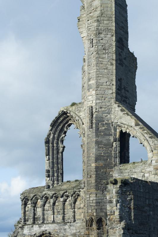 Vertical detail close up of old stone tower ruins of Saint Andrews Cathedral in Scotland