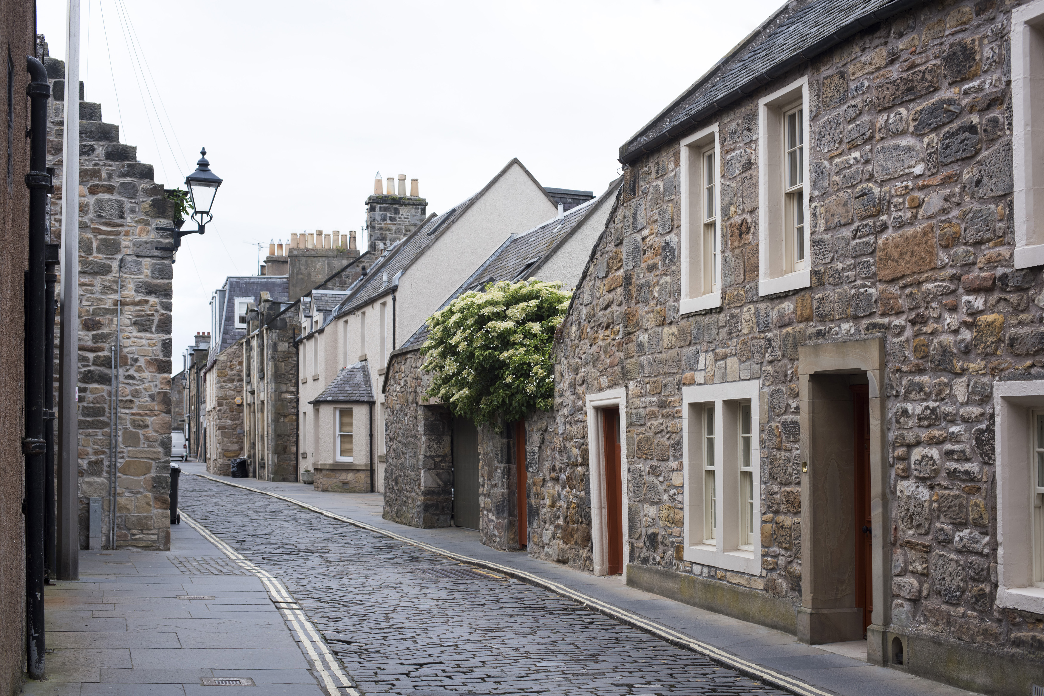 an image of old cobble or set stone streets in st andrews, fife, scotland