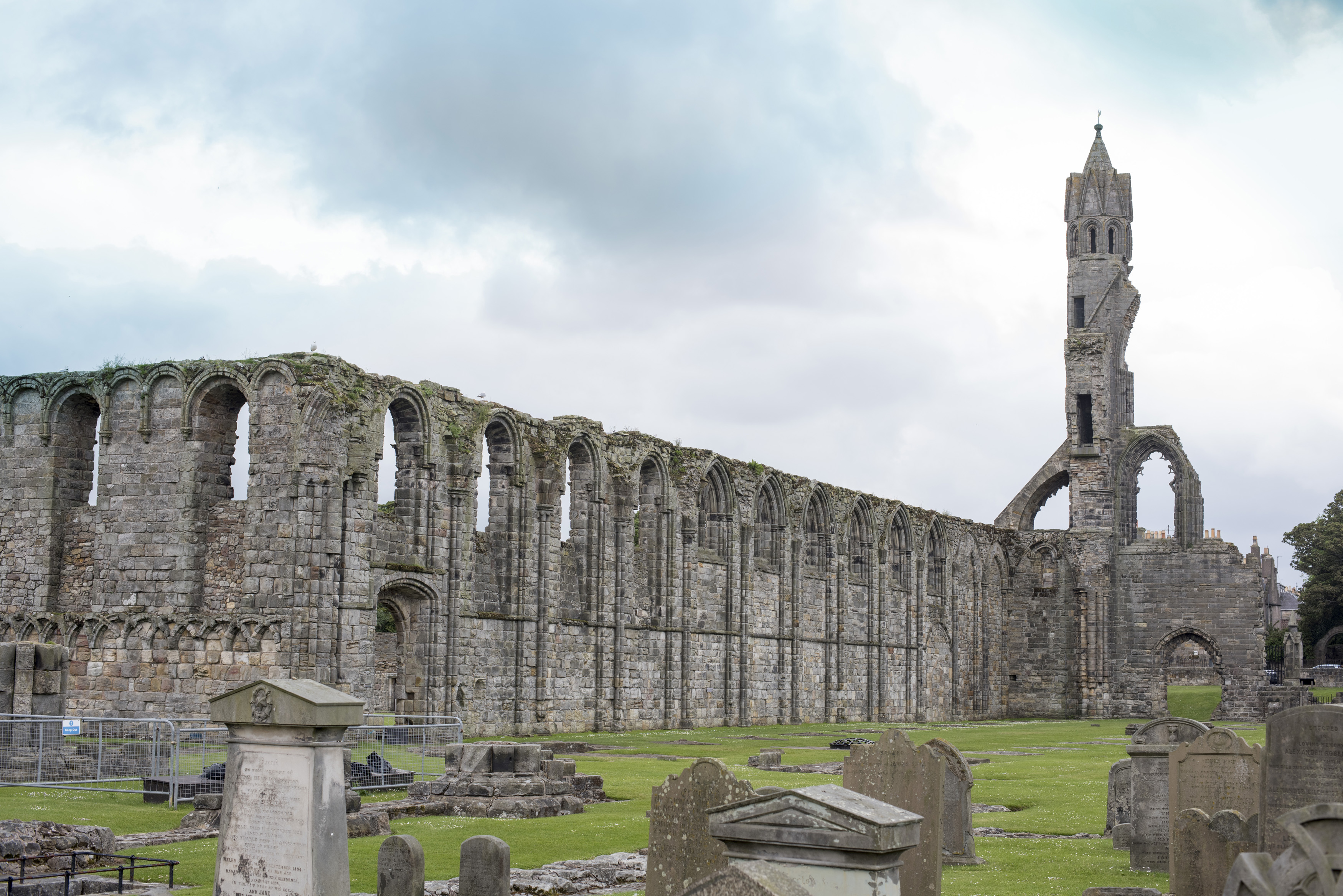 an image of View from old graveyard in front of historic ruins of Saint Andrews Cathedral in Scotland