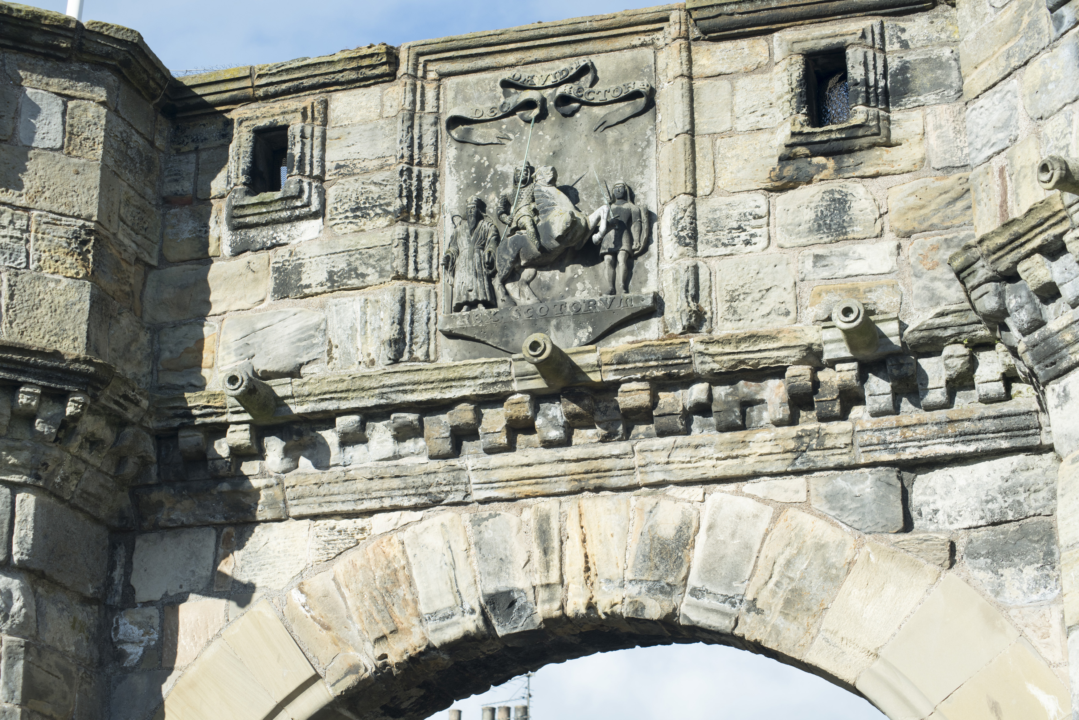 an image of Stone carvings on the West Port, or historic gate to the town, St Andrews, Scotland