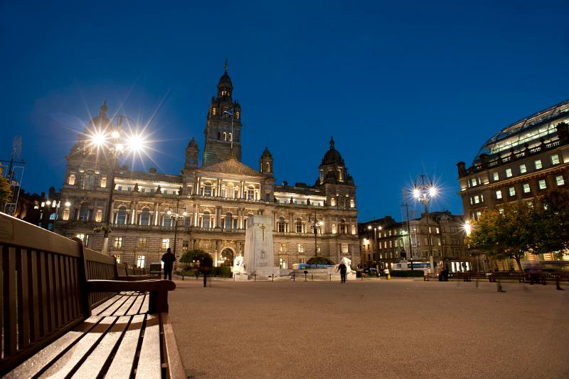 a view of george square, glasgow at night