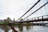 South Portland Street Suspension Bridge over the River Clyde in Glasgow, Scotland is an old steel Victorian bridge of significant structural interest and a historical landmark