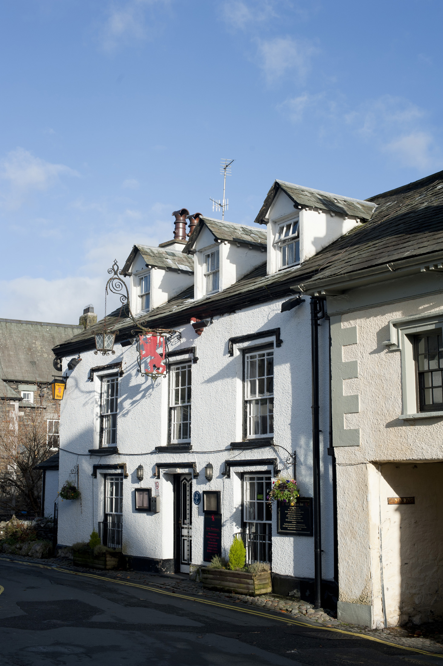 an image of the front of the red lion pub, hawkshead, cumbria
