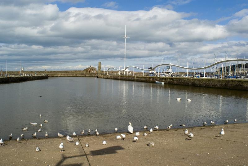 the renovated whitehaven harbour and wave light sculpture and crows nest