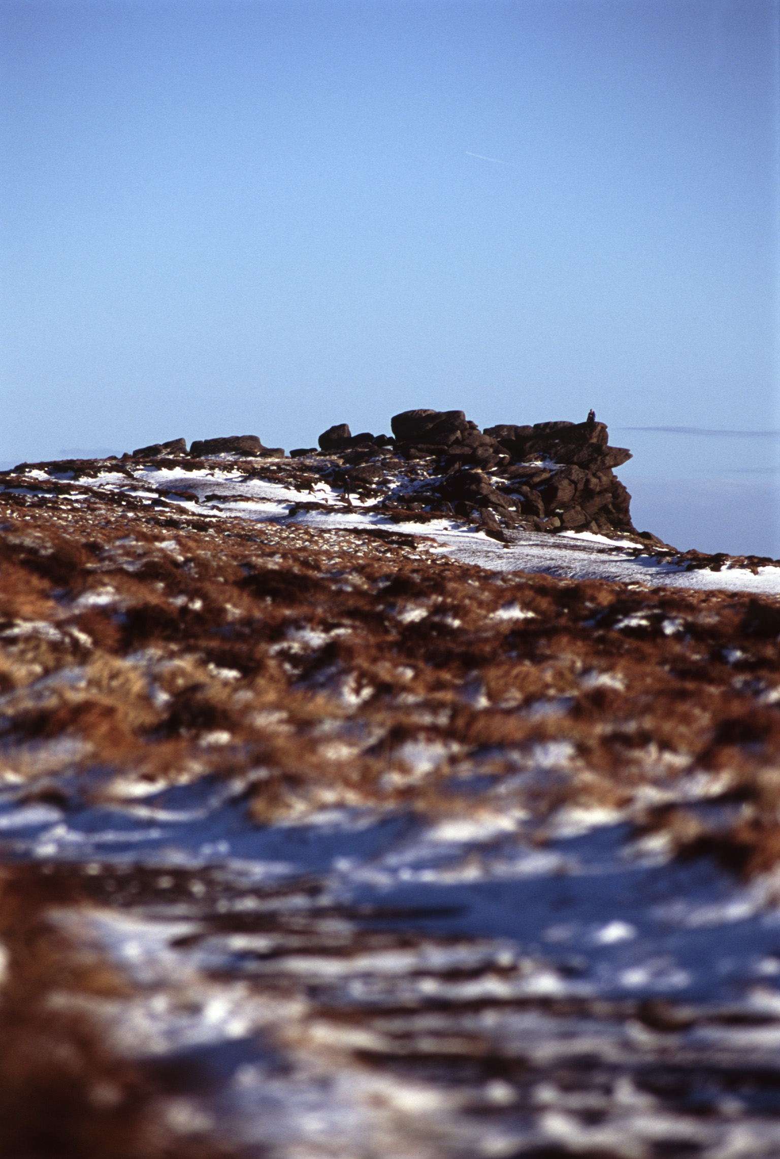 an image of Landscape of Famous Kinder Scout in England on Light Blue Sky Background on One Sunny Day.
