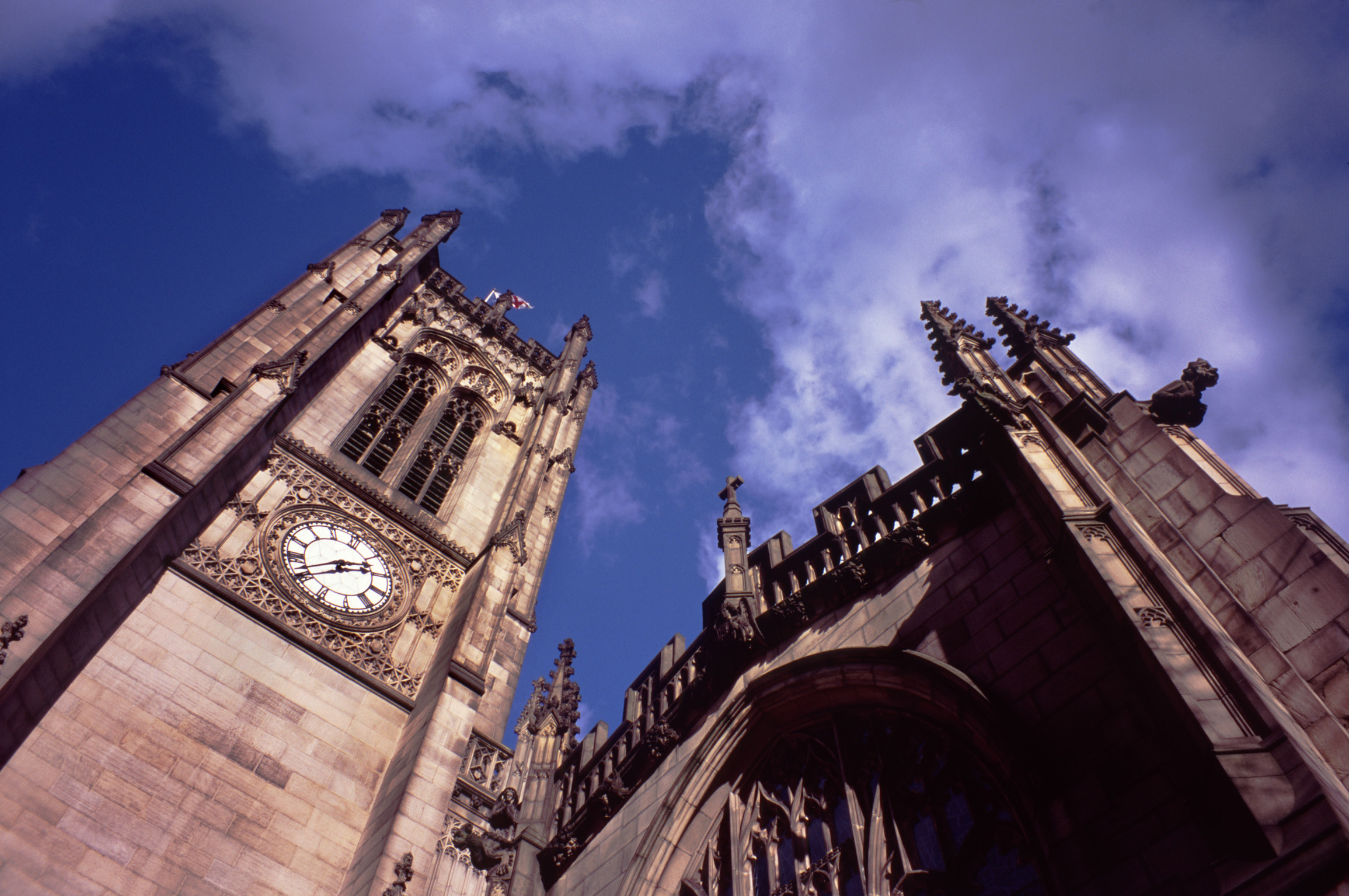 an image of Famous Vintage Architectural Manchester Cathedral Building. Captured from Low Angle Point