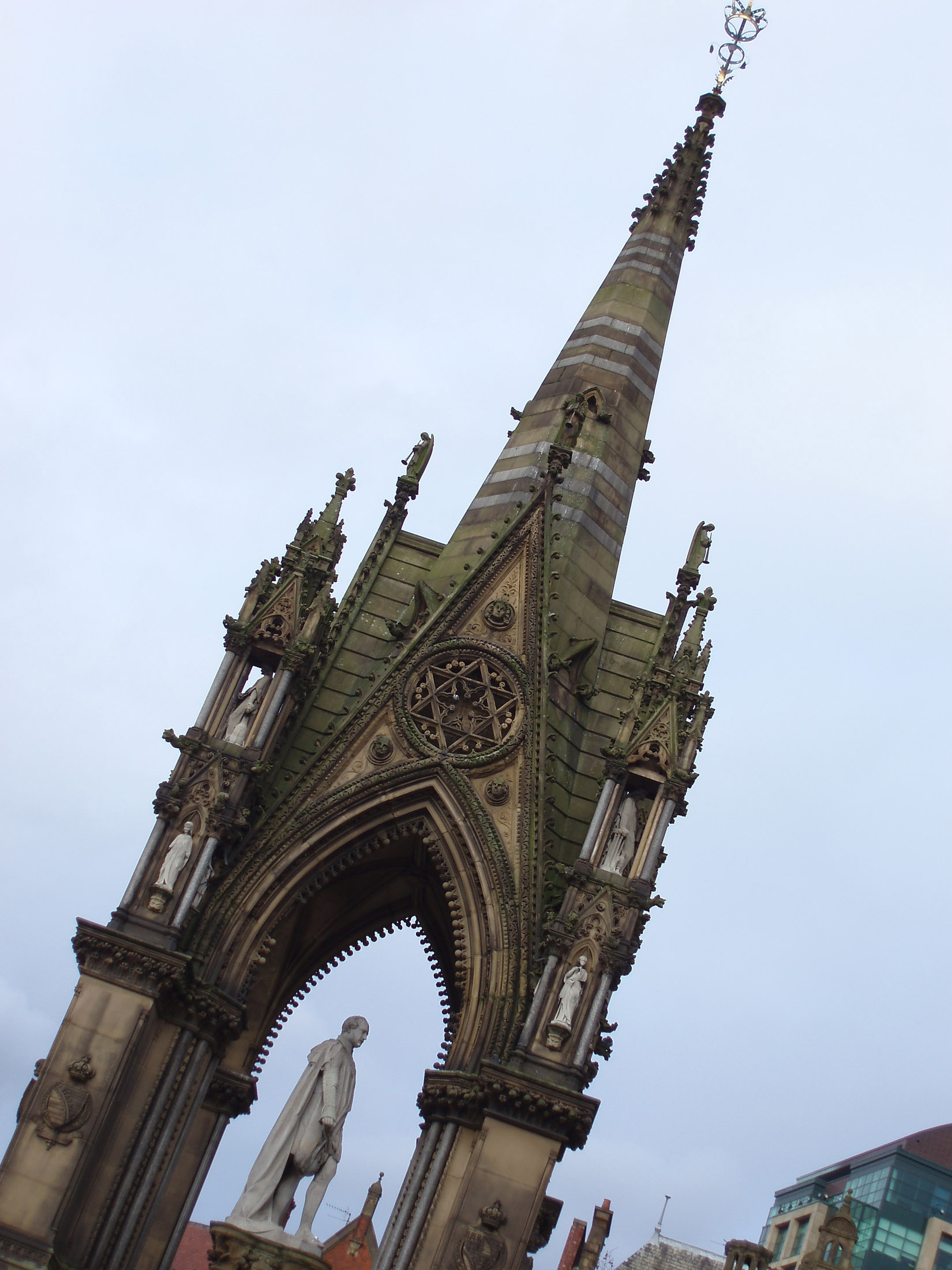 an image of Landmark Albert Memorial in albert square manchester, Captured with Light Blue Sky Background.