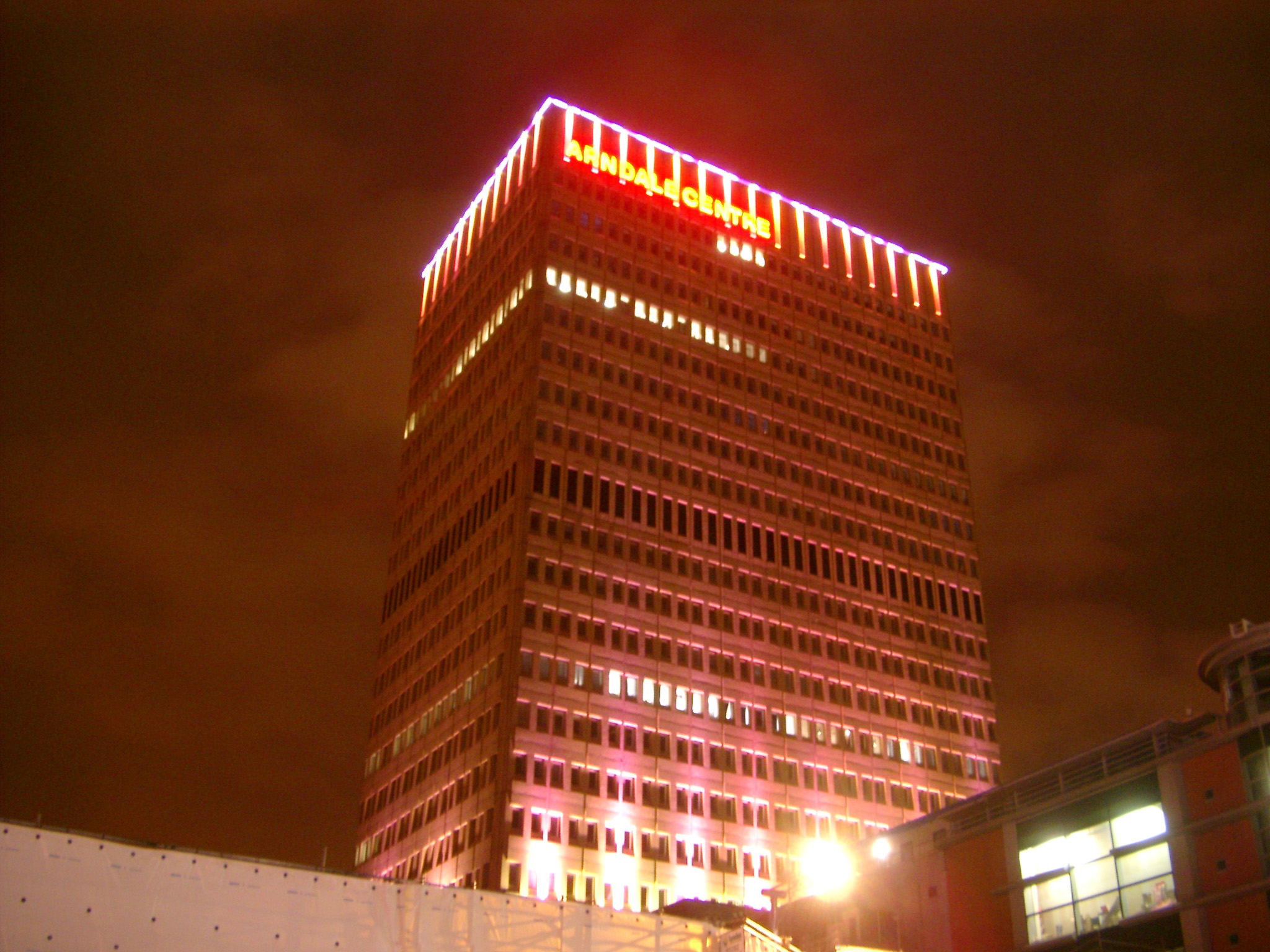 an image of Glowing Lights at Night Time From landmark Arndale Tower in Manchester, England.