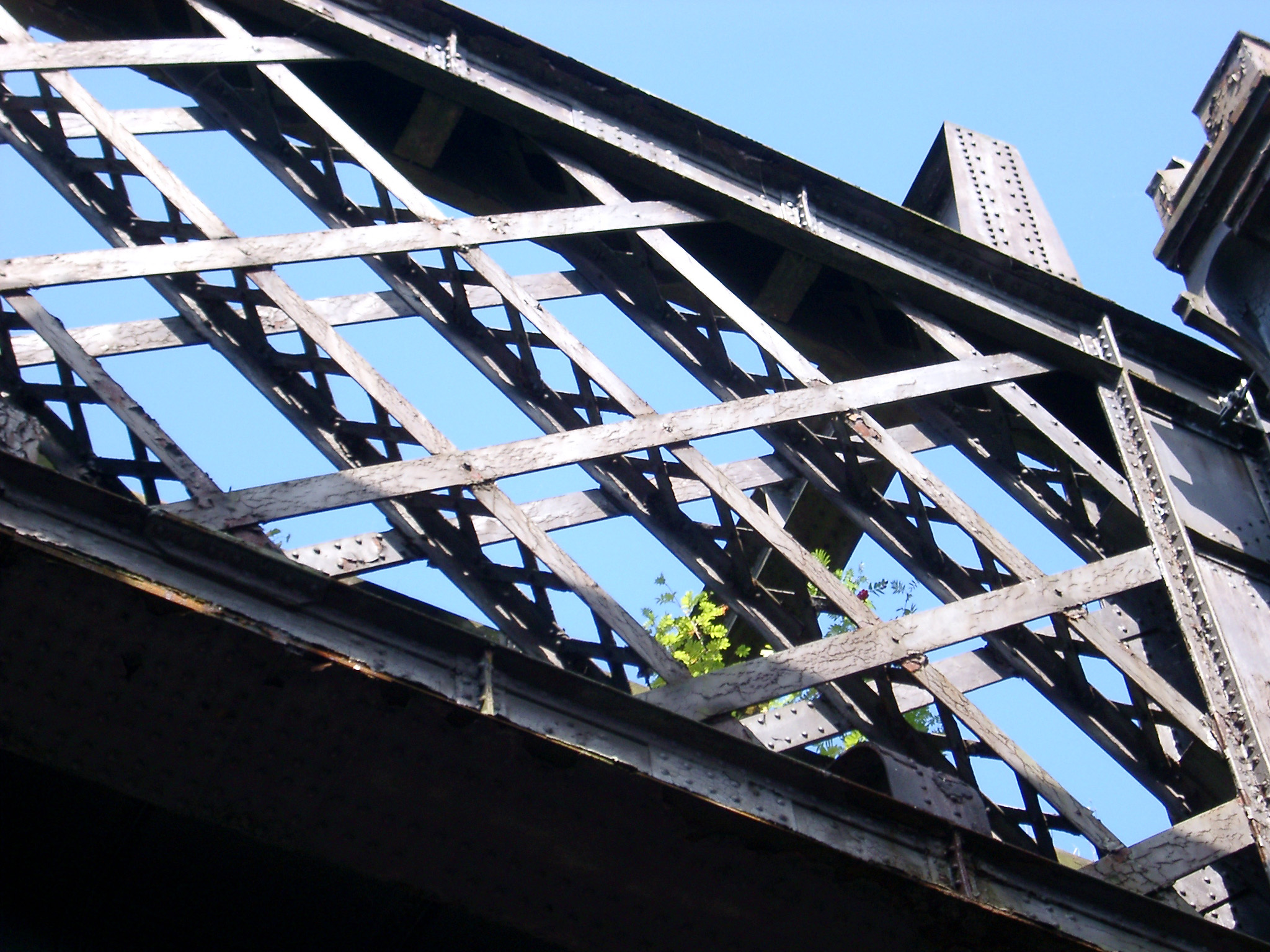 an image of Detail of a metal sky bridge in Castlefield, Manchester, an innercity conservation area for the first industrial canals and warehouses