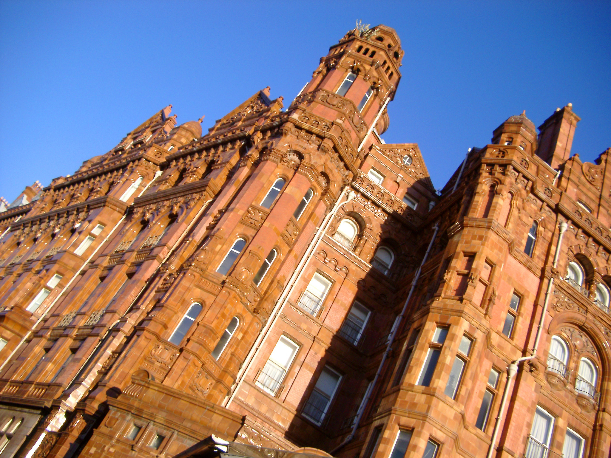 an image of Looking Up at West Facade of Historical Midland Hotel in Manchester, England