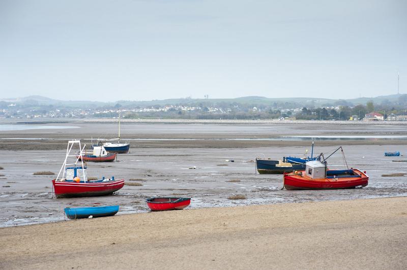 fishing boats at low tide, when the tide goes out in morecambe it goes out a long way, infact the tide has been out since the resorts heyday over 60 years ago