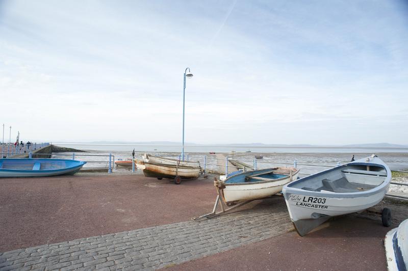 small boats on morecambe stone jetty