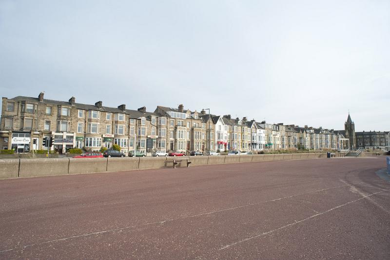 rows of houses on the seafront on morecambes west end
