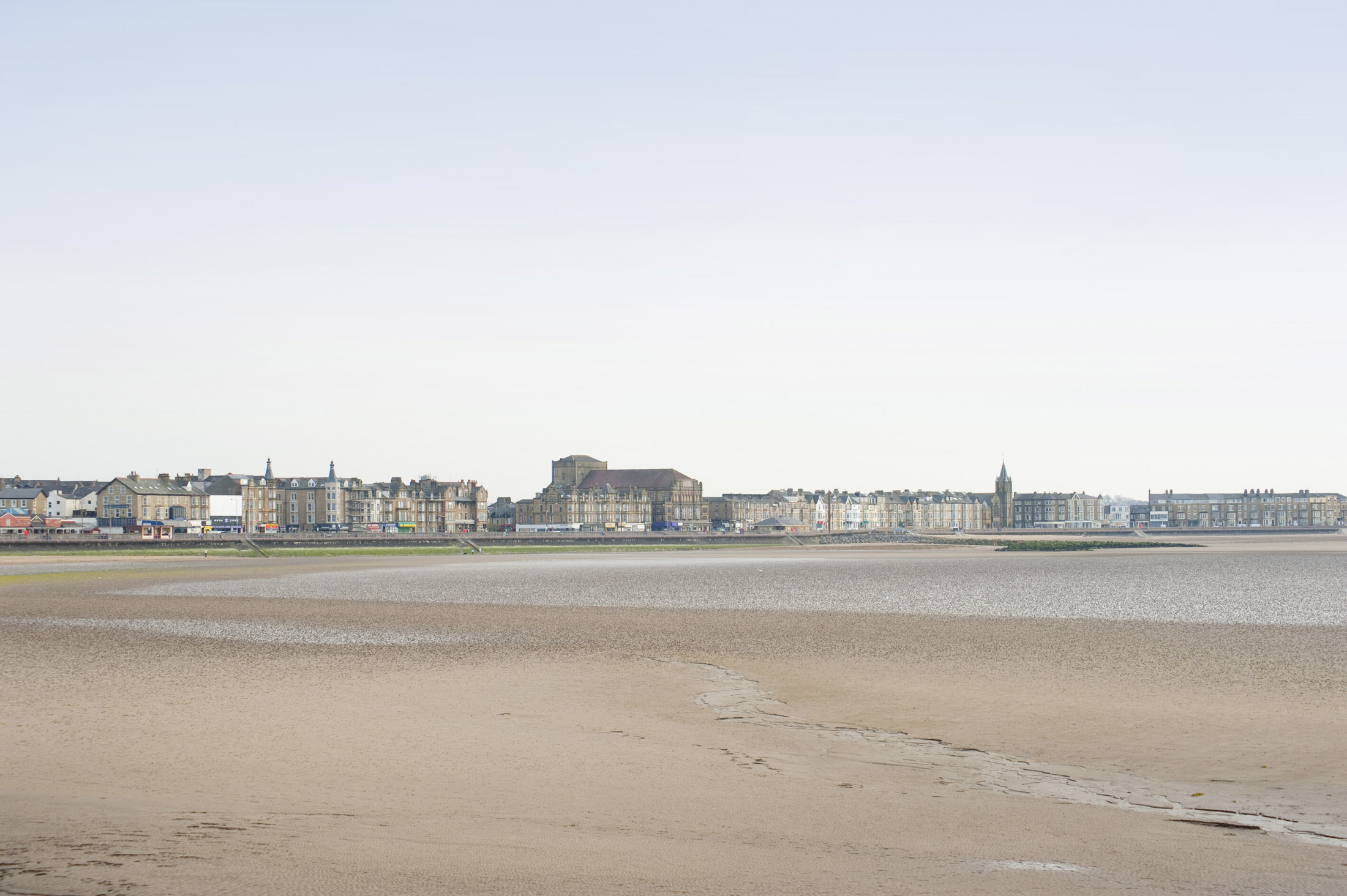 an image of a view of morecambes west end from the stone pier