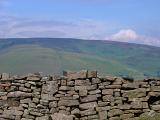 Typical dry stone wall construction without mortar in Derbyshire farmland on the Dales near Edale