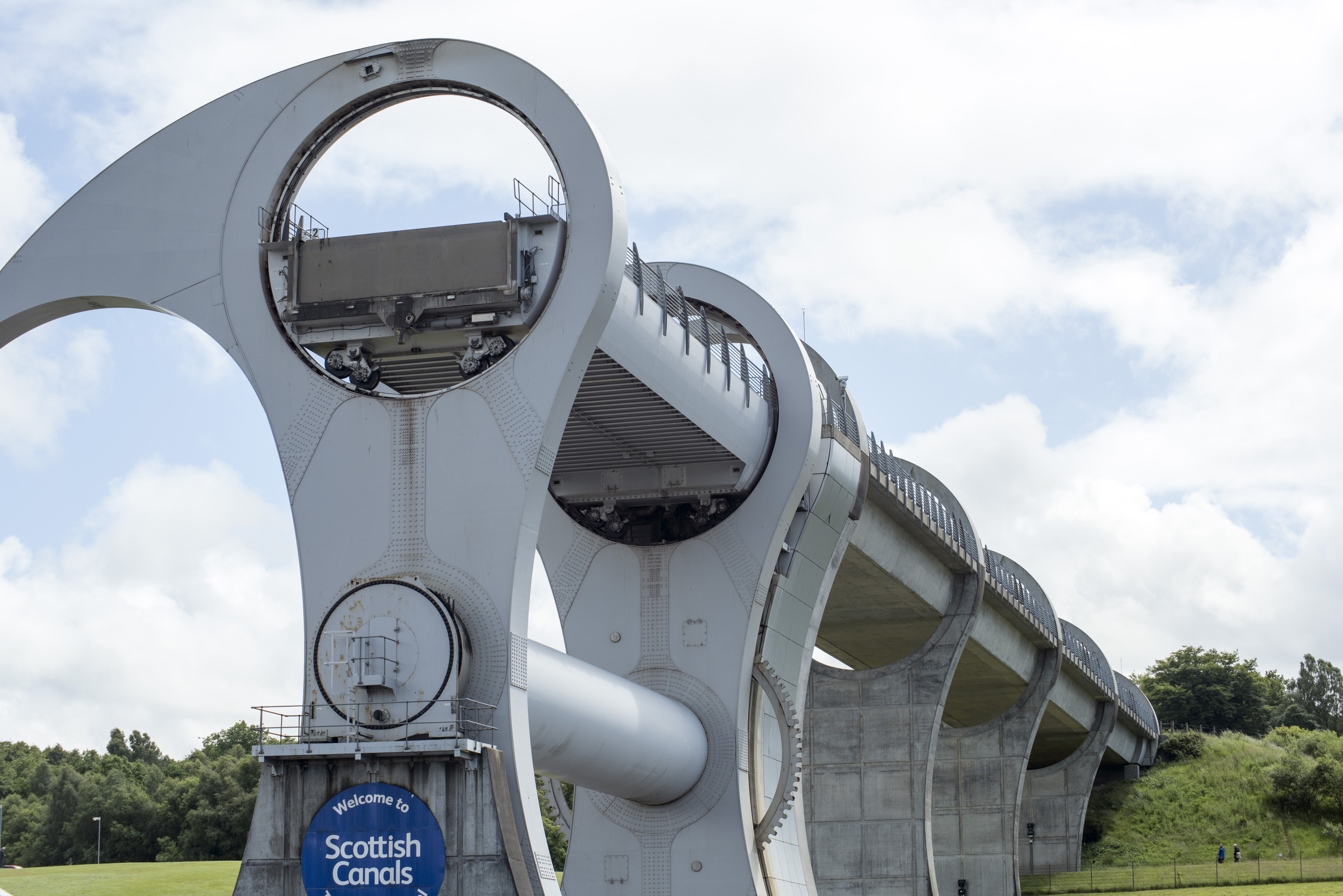 an image of Low angle view on large metallic ring shaped boat lift at elevated position in Falkirk, Scotland