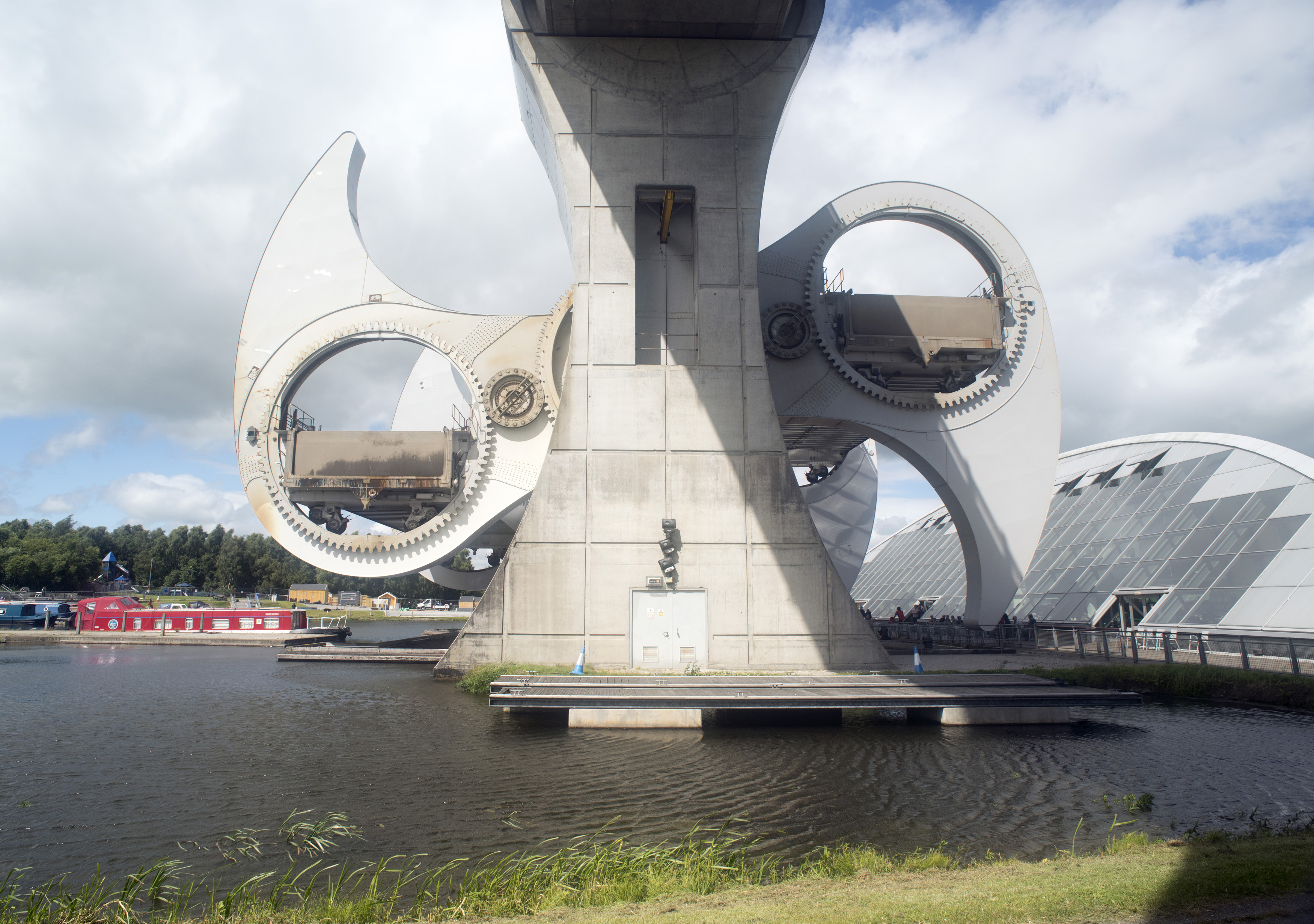 an image of View from under viaduct at the giant Scottish Falkirk Wheel boat lift rotating showing off gears which hold boats