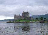 Eilean Donan Castle, Located in the Western Highlands of Scotland. Captured on the Afternoon with Gray Sky Background.