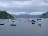 fishing and pleasure boats in the harbour at portree, hebrides scotland