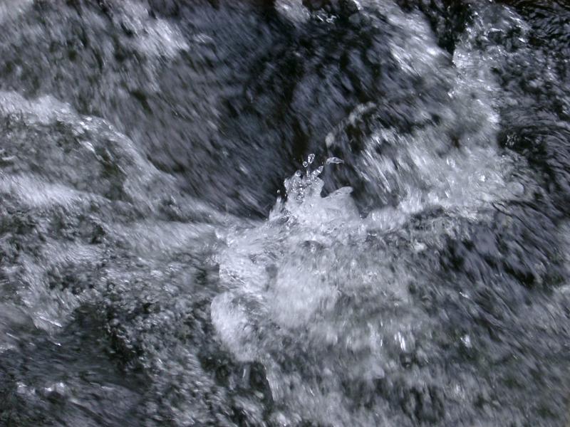Clean clear refreshing flow of turbulent water, a natural resource