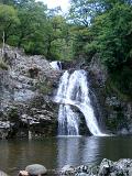 Scenic View of River Mawddach Waterfall Cascading Down Rock Face, Gwynedd, North Wales