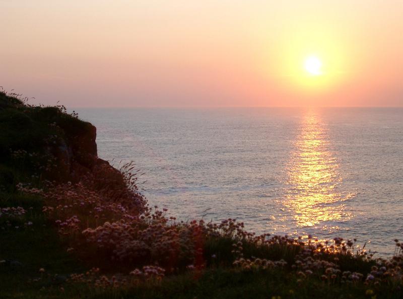 Scenic of Sunset Over North Atlantic Ocean as seen from Cliffs of Butt of Lewis, Outer Hebrides, Scotland