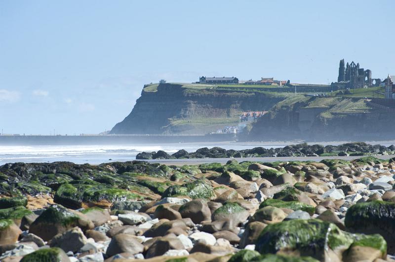 headland to the east of whitby with the landmark abbey ruins on top