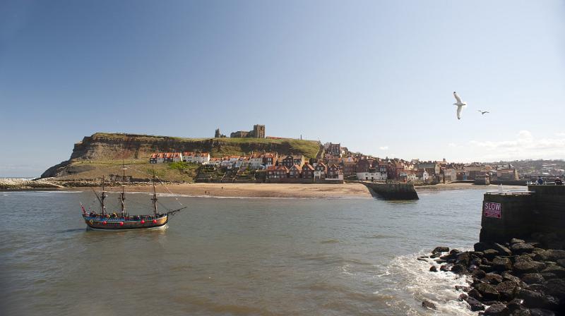 a classic tall ship style vessel on whitby lower harbour