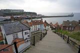 a view walking down the lower part of whitbys famous 199 steps into the town