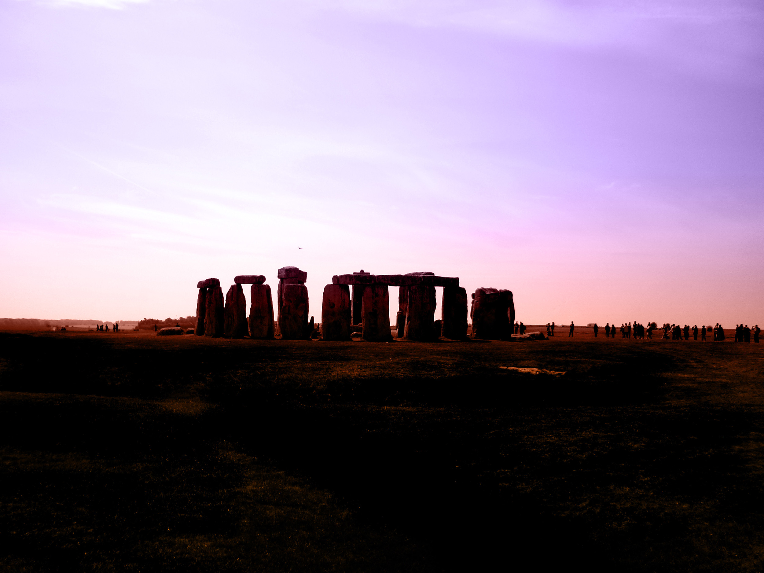 an image of colorful sky over the wiltshires famous stone circle