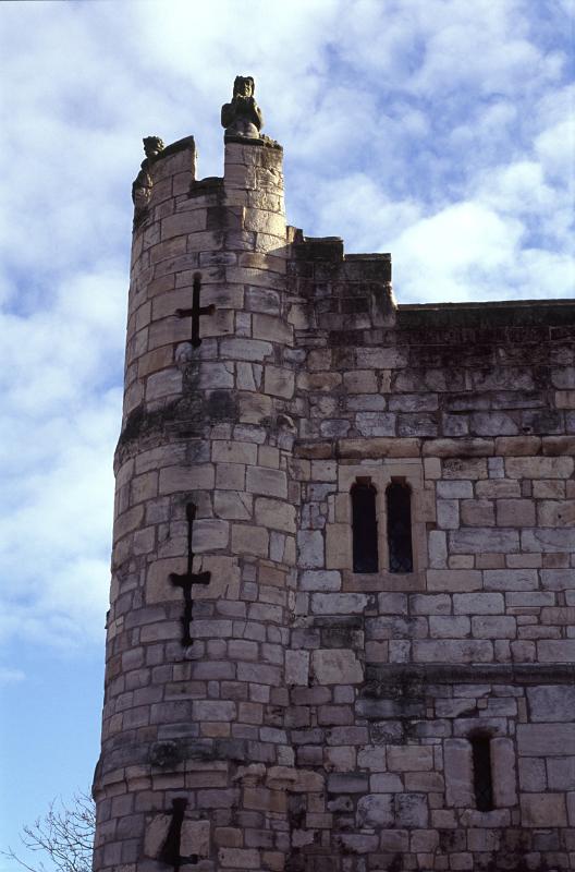 Fortified York bar with its narrow arrow holes in the circular crenellated tower of the gatehouse in York, UK