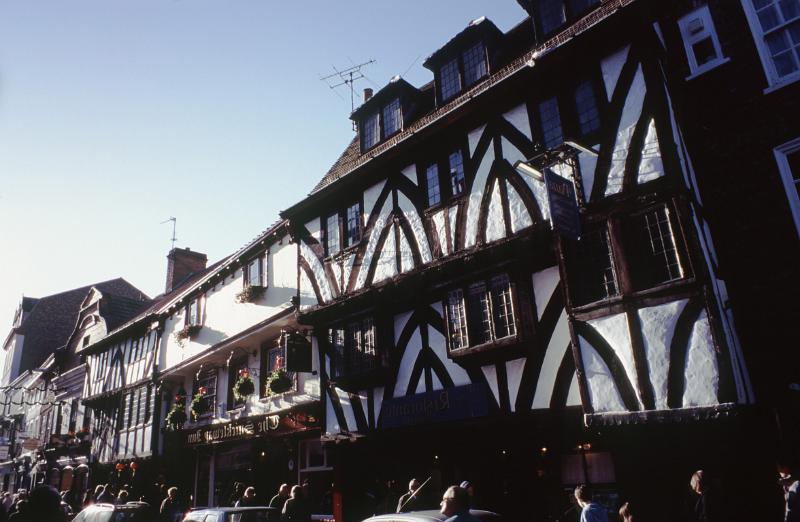Traditional historical Tudor timber framed houses in York with overhanging bay windows in an architectural and travel background