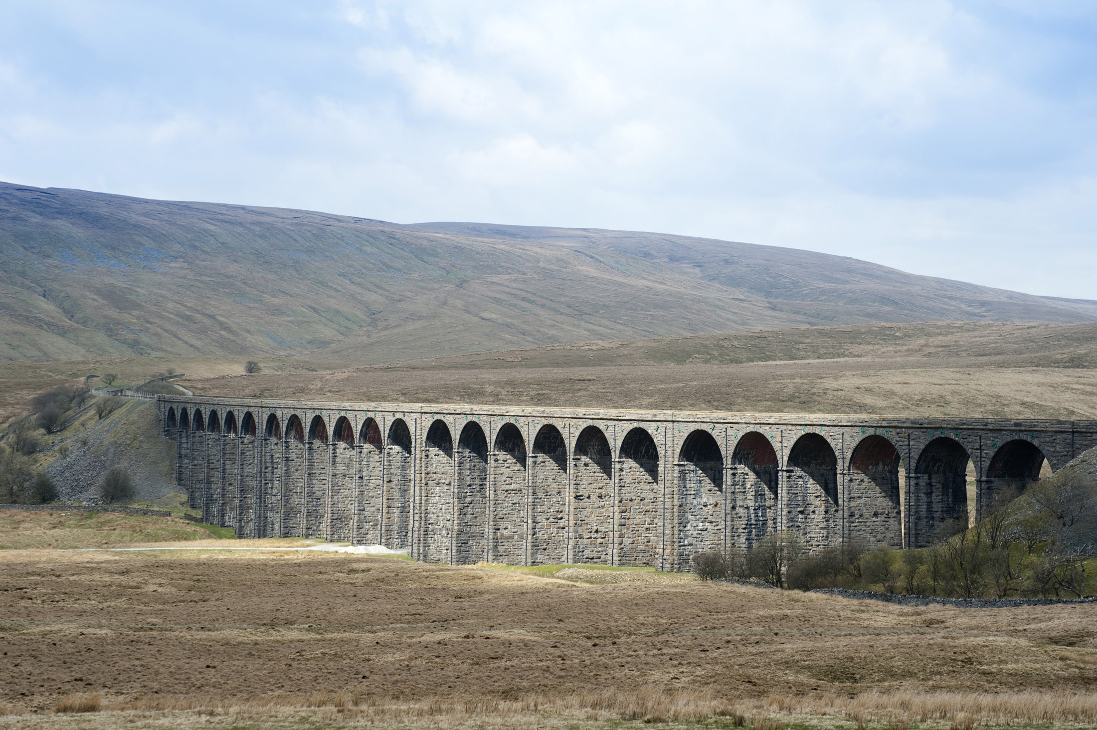 an image of 24 stone arches crossing the ribble valley make up the ribblehead viaduct