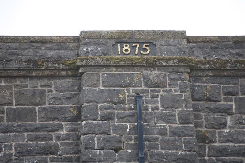 details of a memorial stone at the centre of the ribblehead viaduct marking the opening in 1875