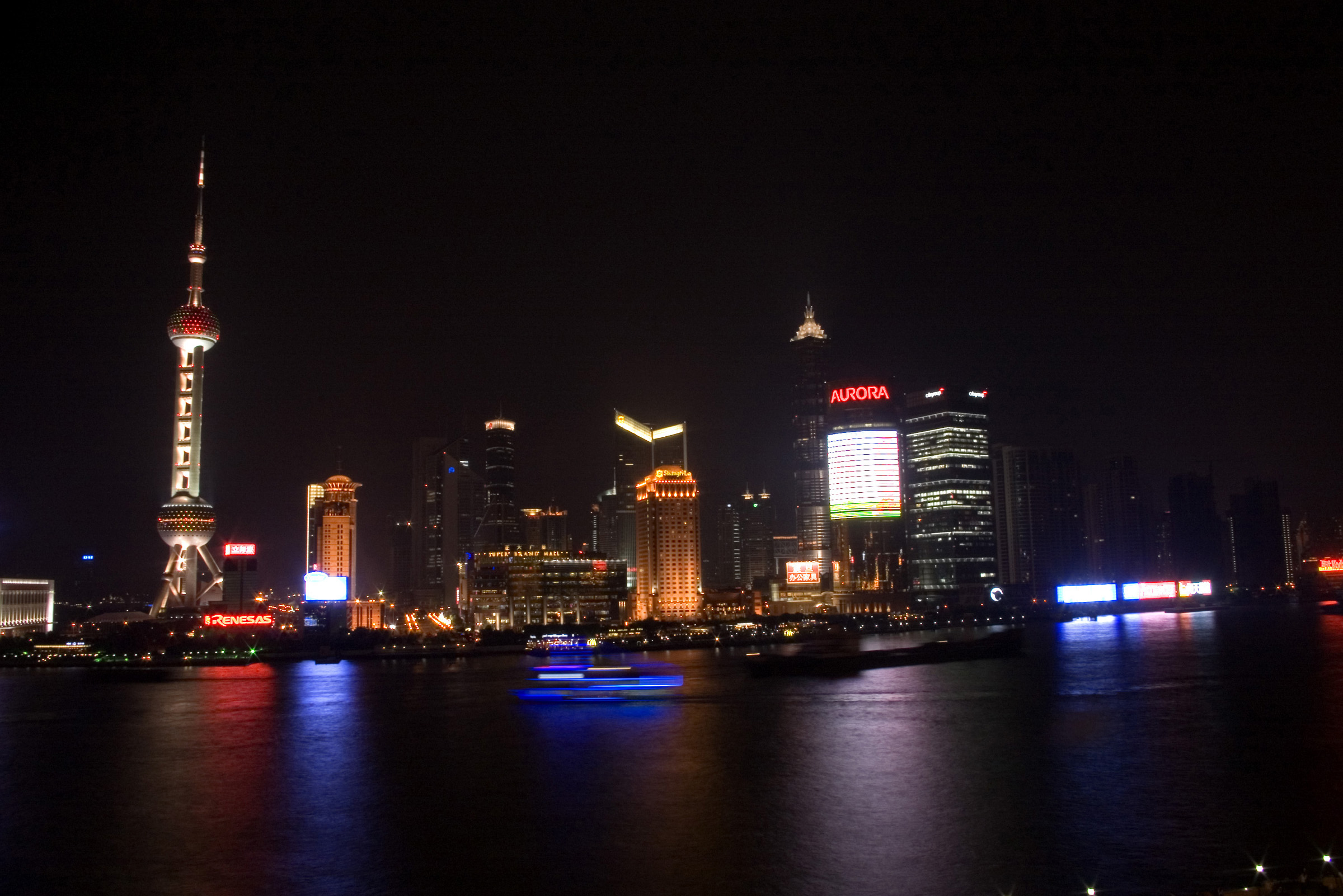 an image of Beautiful Attraction of City Night Lights from Various Commercial Buildings at Shanghai China.