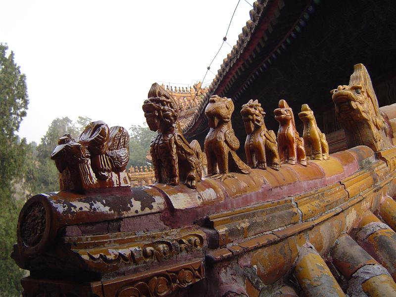 Close up Artistic Sculptures at Temple Roof Close up Small Artistic Sculptures at Vintage Temple Roof in China.