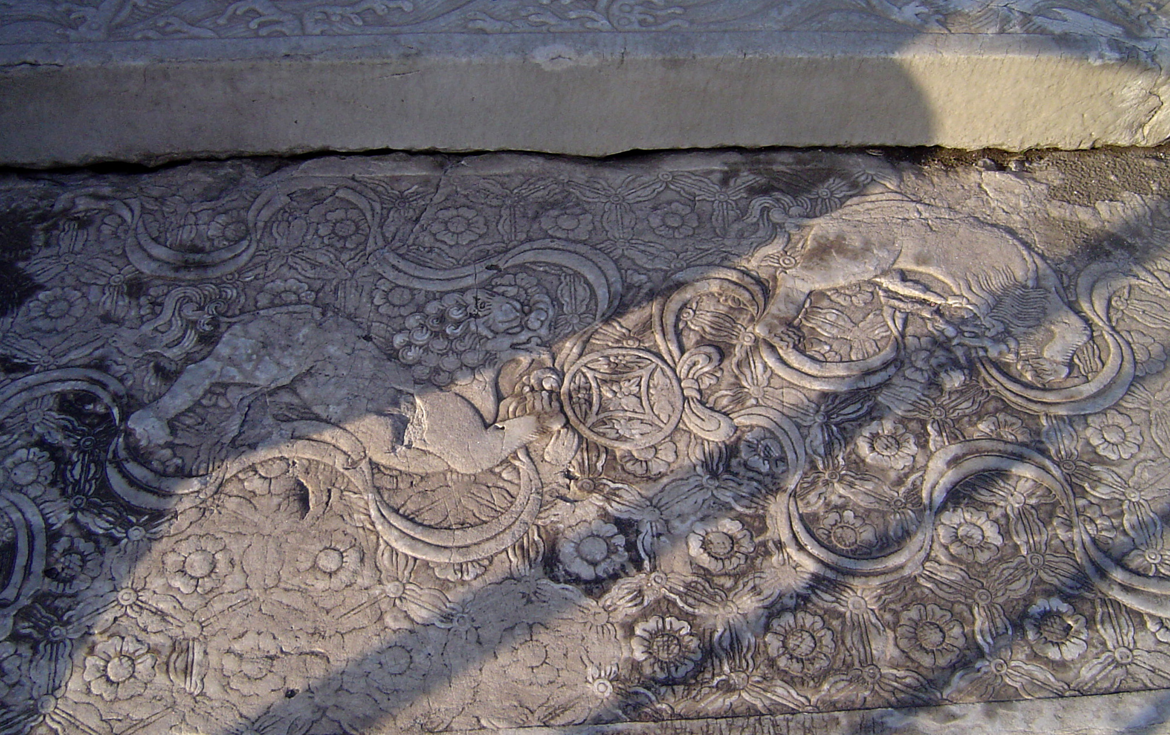 an image of Close up Artistic Vintage Abstract Stone Carving Art at the Temple in China.