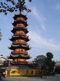 Famous Historic High Pagoda Building in China. Captured in Light Blue Sky Background.