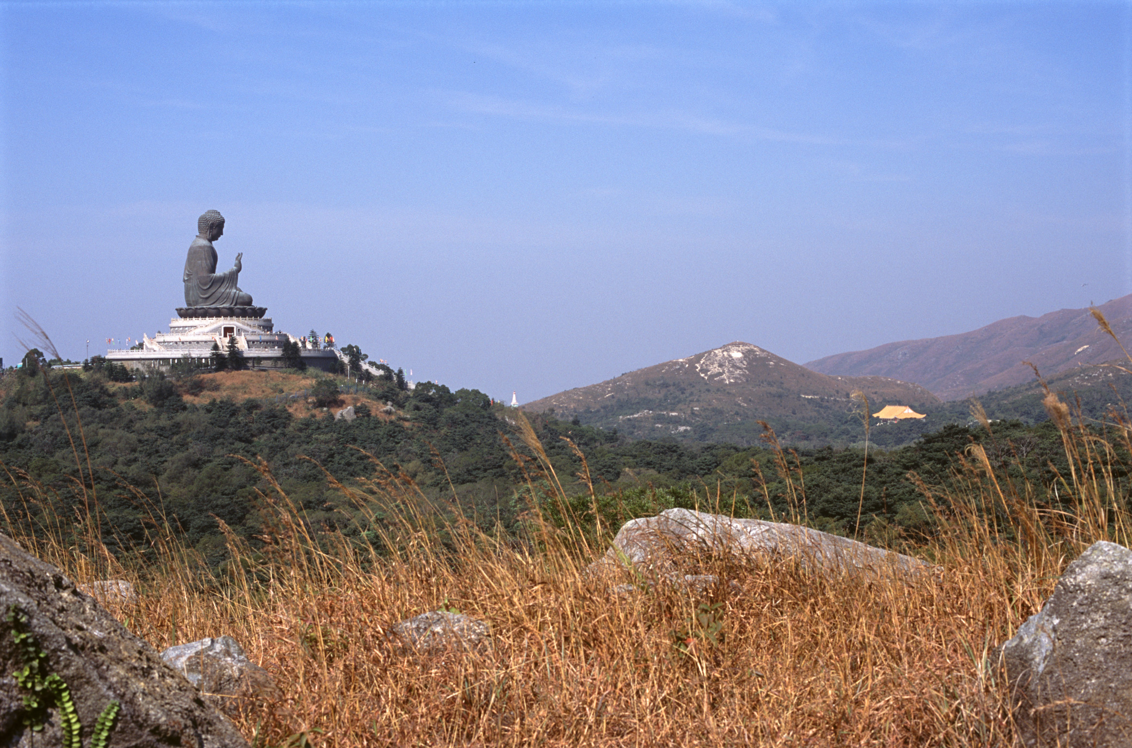 an image of Famous Big Buddha Statue with Light Blue Sky Background.