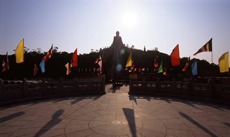 Large Buddha Backlit by Sun at Hong Kong Temple, China