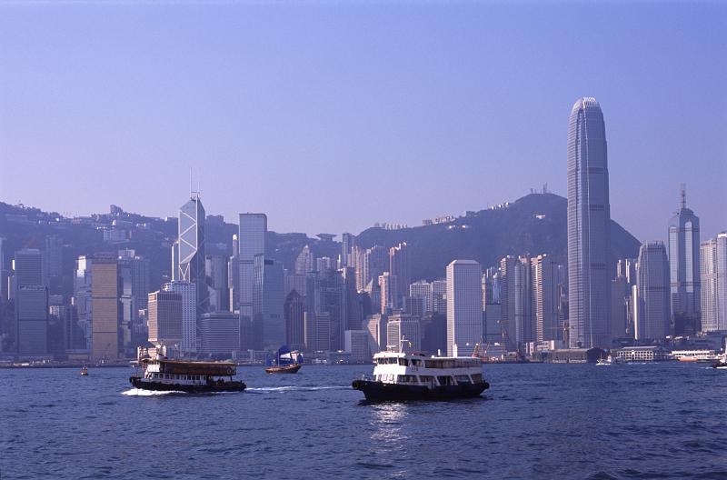 Star Ferry in Victoria Harbor with Hong Kong Skyline, China
