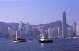 Star Ferry in Victoria Harbor with Hong Kong Skyline, China