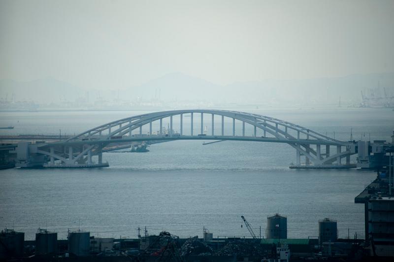 View across osaka bay towards the Floating Openable Yumemai Bridge, Japan