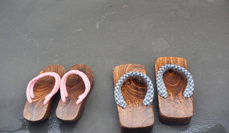 His and hers outdoor slippers or clogs, traditional japanese footwear still commonly worn