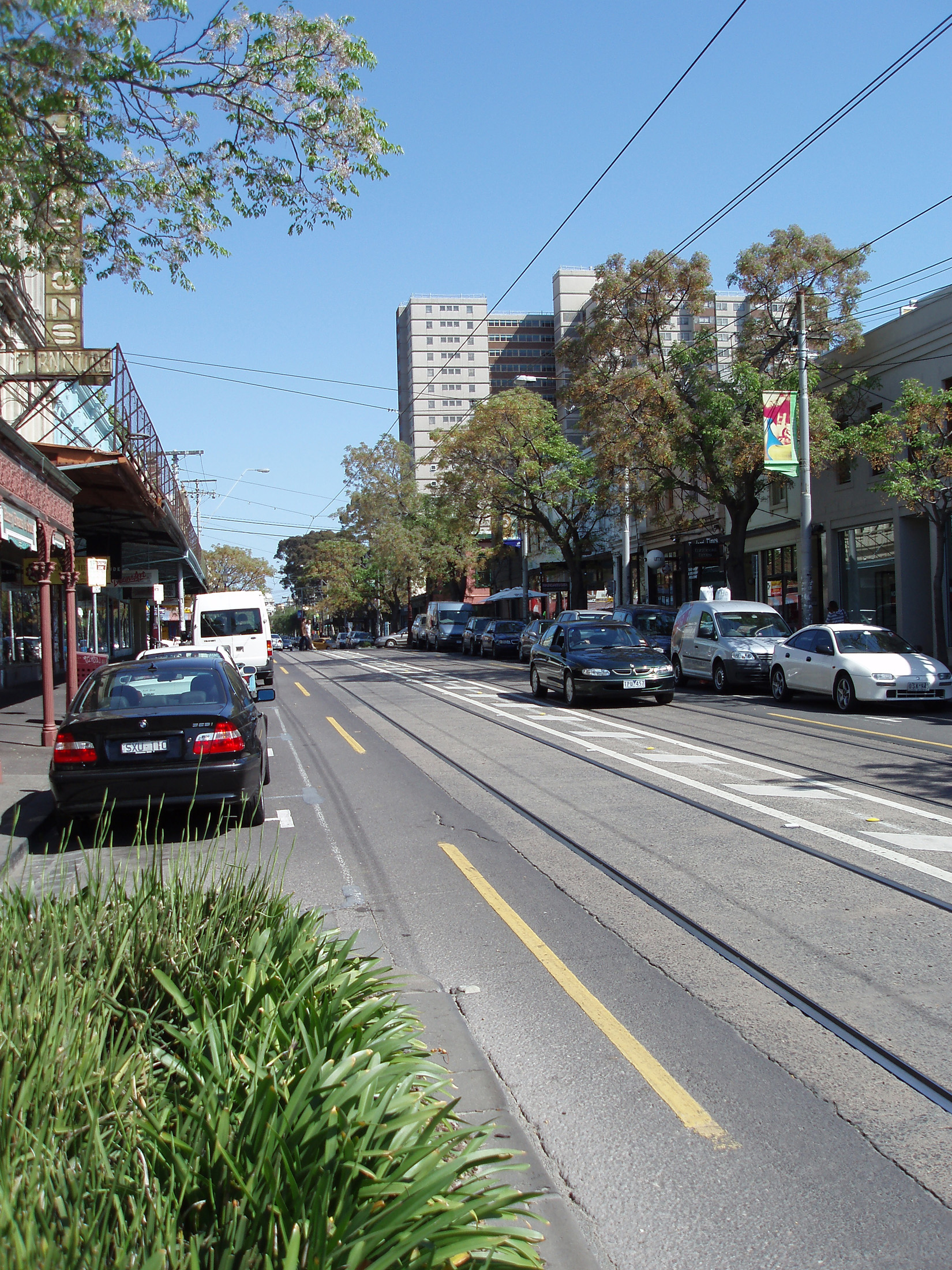 an image of Cars at Famous Fitzroy Street in Melbourne with no Traffic During Morning Time.